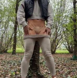 Gym girl in the woods showing her pussy